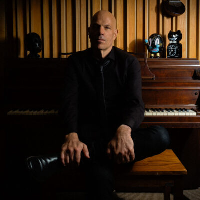 image of Jimmy Harry at the piano in his studio